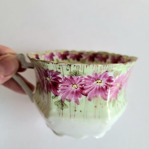 Antique porcelain tea cup with saucer with pink floral design and gold trim. - Picture 12 of 13